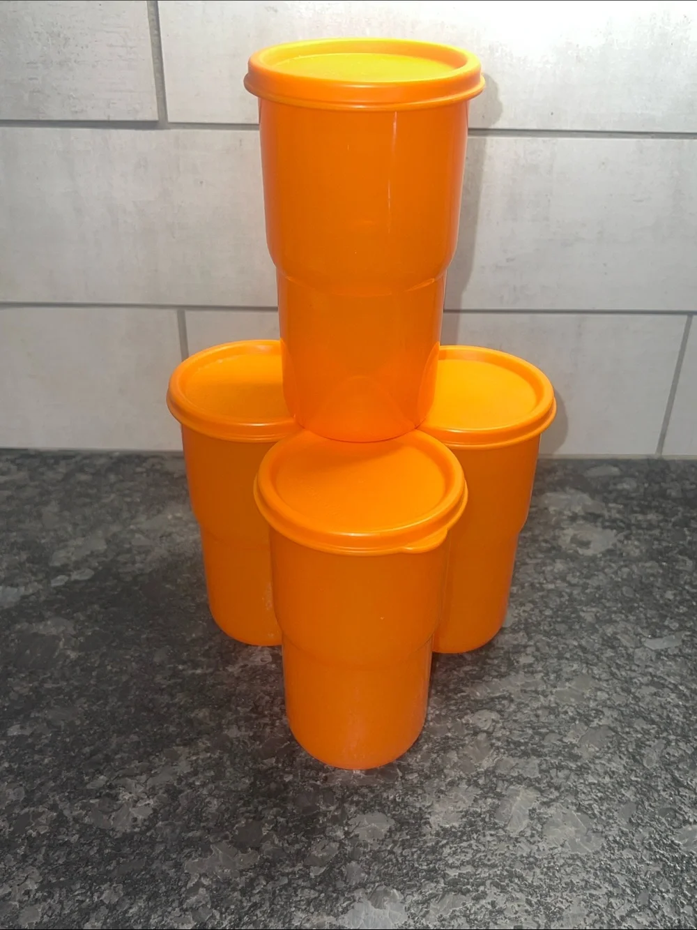 Tupperware Covered Tumblers. Orange Stackable Plastic Storage Cups - Set of 4